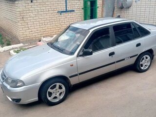 2011 Daewoo Nexia I Рестайлинг, серебристый, 240000 рублей, вид 2