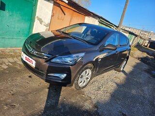2015 Hyundai Solaris I Рестайлинг, коричневый, 950000 рублей, вид 1