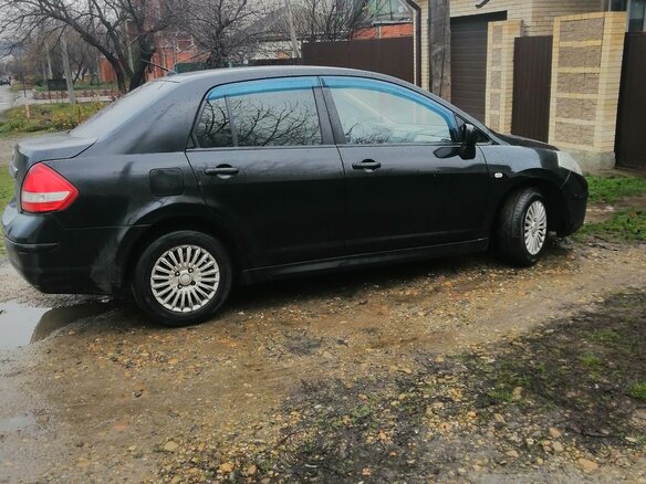 2011 Nissan Tiida I Рестайлинг, чёрный, 580000 рублей - вид 1