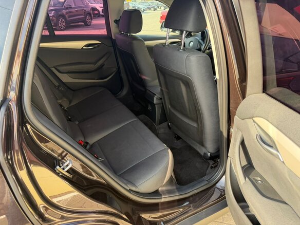 2014 BMW X1 20i I (E84) Рестайлинг, коричневый, 1480000 рублей - вид 19