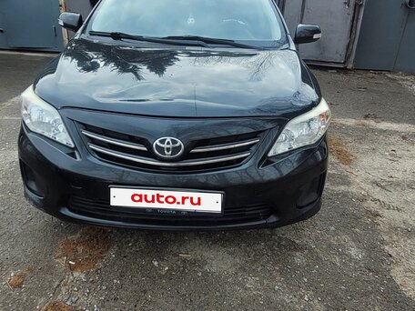 2011 Toyota Corolla X (E140, E150) Рестайлинг, чёрный, 900000 рублей, вид 2