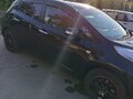 2014 Nissan Leaf (EM57) I (ZE0/AZE0), чёрный, 1450000 рублей - вид 4