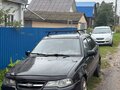 2012 Daewoo Nexia I Рестайлинг, чёрный, 100000 рублей