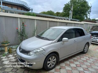 2012 Nissan Tiida I Рестайлинг, серебристый, 950000 рублей, вид 2
