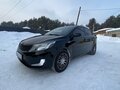 2013 Kia Rio 5-speed III, чёрный, 800000 рублей - вид 3