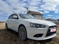 2011 Mitsubishi Lancer X Рестайлинг, белый, 800000 рублей - вид 2