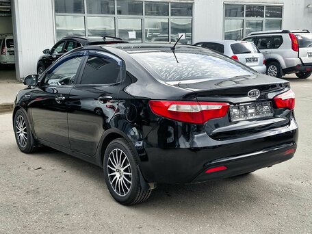 2011 Kia Rio 5-speed III, чёрный, 480000 рублей, вид 4