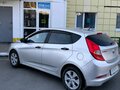 2014 Hyundai Solaris I Рестайлинг, серебристый, 1150000 рублей - вид 1