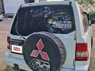 1999 Mitsubishi Pajero iO, белый, 520000 рублей, вид 2