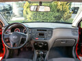 2010 Kia Rio II Рестайлинг, красный - вид 10
