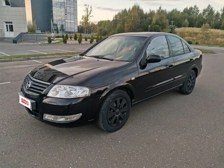 2010 Nissan Almera Classic I, чёрный, вид 1