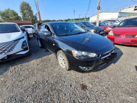 2012 Mitsubishi Lancer X Рестайлинг, чёрный, 603000 рублей, вид 4