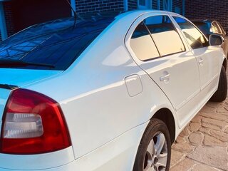 2012 Skoda Octavia II (A5) Рестайлинг, белый, 1470000 рублей, вид 3
