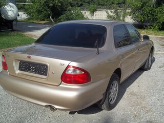 1999 Kia Clarus II, бежевый, 380000 рублей, вид 5