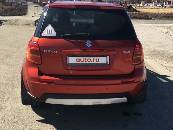 2011 Suzuki SX4 I (Classic) Рестайлинг, оранжевый - вид 2