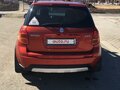 2011 Suzuki SX4 I (Classic) Рестайлинг, оранжевый - вид 2