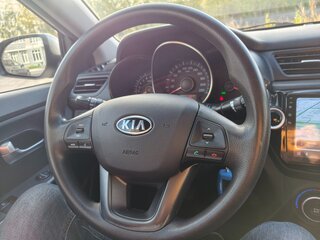 2011 Kia Rio III, серебристый, 660000 рублей, вид 4