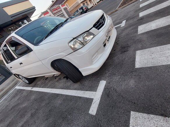 2000 Mazda Demio I (DW), белый, 260000 рублей - вид 15