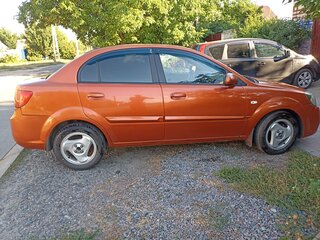 2010 Kia Rio II Рестайлинг, оранжевый, 465000 рублей, вид 3