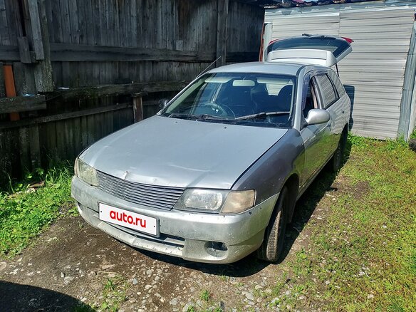 2000 Mazda Familia Y11, серебристый