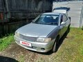 2000 Mazda Familia Y11, серебристый