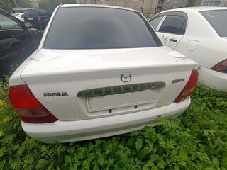 2002 Mazda Familia VIII (BJ), белый, 171000 рублей, вид 4
