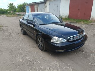 2001 Kia Clarus II, чёрный, 250000 рублей, вид 4