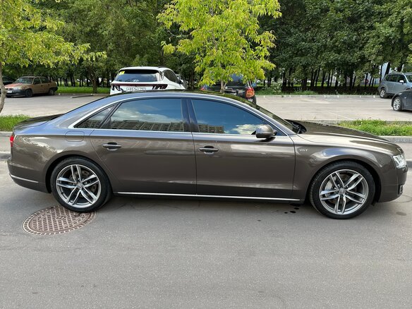 2015 Audi A8 Long III (D4) Рестайлинг, коричневый - вид 1