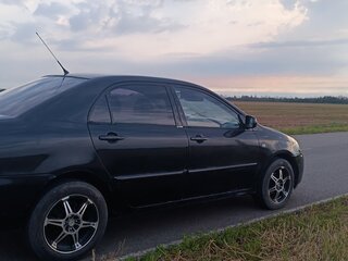 2006 Toyota Corolla IX (E120, E130) Рестайлинг, чёрный, 650000 рублей, вид 5