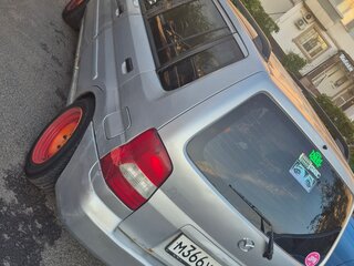 2002 Mazda Demio I (DW), серебристый, 130000 рублей, вид 4
