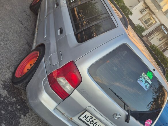 2002 Mazda Demio I (DW), серебристый, 150000 рублей - вид 3