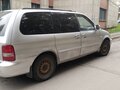 2005 Kia Carnival I Рестайлинг, серебристый, 480000 рублей - вид 1