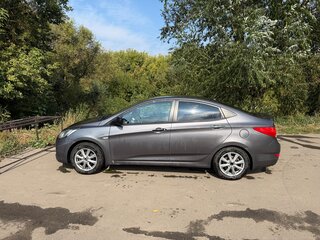 2011 Hyundai Solaris I, чёрный, 690000 рублей, вид 4