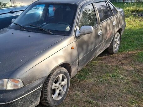 2001 Daewoo Nexia I, коричневый, 90000 рублей, вид 1