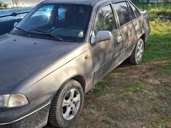 2001 Daewoo Nexia I, коричневый, 90000 рублей
