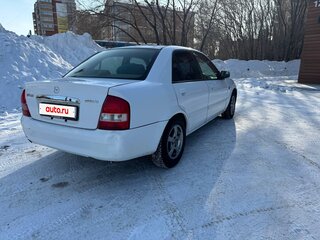 2001 Mazda Familia VIII (BJ), белый, 230000 рублей, вид 3