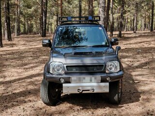 2012 Suzuki Jimny III Рестайлинг 2, серый, 1400000 рублей, вид 1