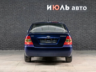 2006 Toyota Corolla IX (E120, E130) Рестайлинг, синий, 700000 рублей, вид 3