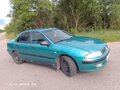 2002 Mitsubishi Carisma I Рестайлинг, серебристый, 220000 рублей - вид 1
