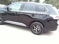 2014 Mitsubishi Outlander III, чёрный - вид 4