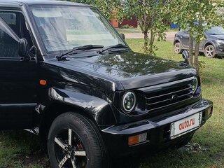 1996 Mitsubishi Pajero Junior, чёрный, 500000 рублей, вид 2