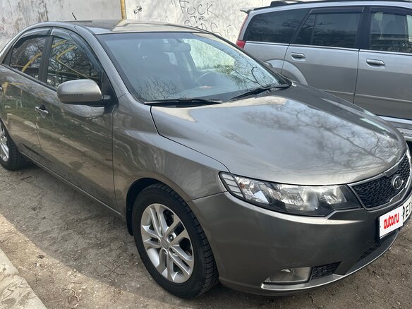 2011 Kia Cerato 4-speed II, серый, 1100000 рублей - вид 4