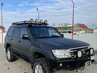 2004 Toyota Land Cruiser 105 100 Series Рестайлинг 1, серый, 3900000 рублей, вид 1