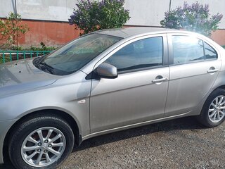 2012 Mitsubishi Lancer X Рестайлинг, серебристый, 950000 рублей, вид 2