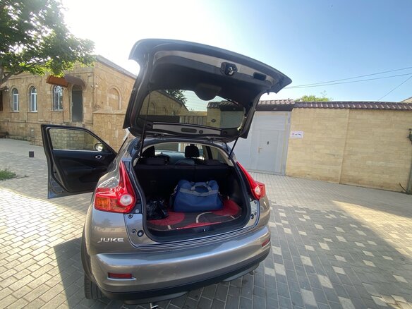2014 Nissan Juke I, серый, 1350000 рублей - вид 4