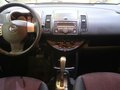 2007 Nissan Note I, оранжевый, 720000 рублей - вид 8