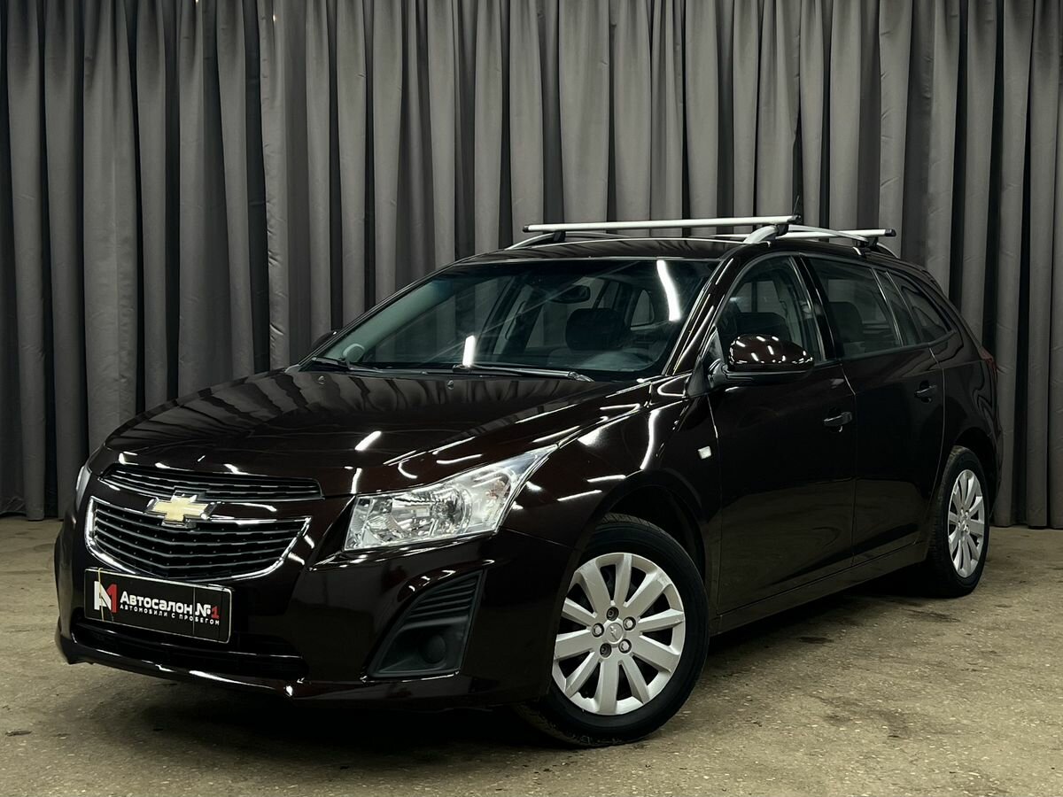 Открыть фотографии: Chevrolet Cruze I Рестайлинг