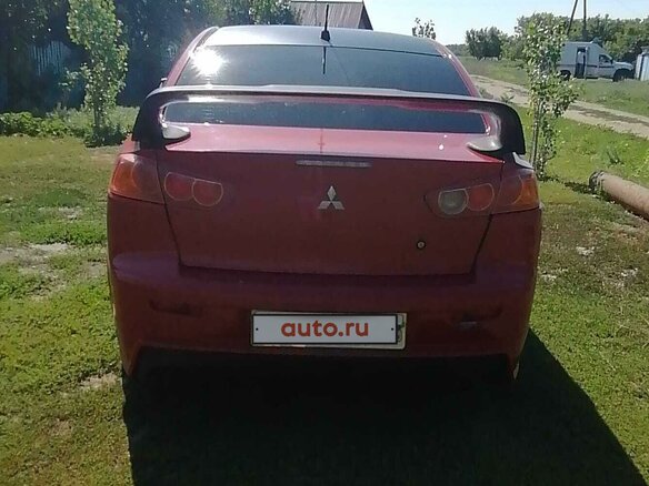 2007 Mitsubishi Lancer X, красный, 685000 рублей - вид 1