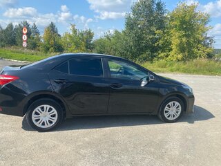 2013 Toyota Corolla XI (E160, E170, E180), чёрный, 1300000 рублей, вид 5