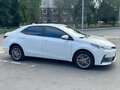 2018 Toyota Corolla XI (E160, E170, E180) Рестайлинг 1, белый - вид 4